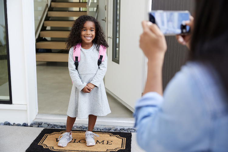 This Mom Was All Of Us On The First Day of Kindergarten | Mom of three, Carolyn Moore, was fully prepped for summer to end and school to start. She'd done the kindergarten routine before with her two eldest, who just started fifth and third grade respectively. But Moore, a writer at Assignment Mom, wasn't prepared for the flood of emotions that came with sending her youngest off to school for the first time.