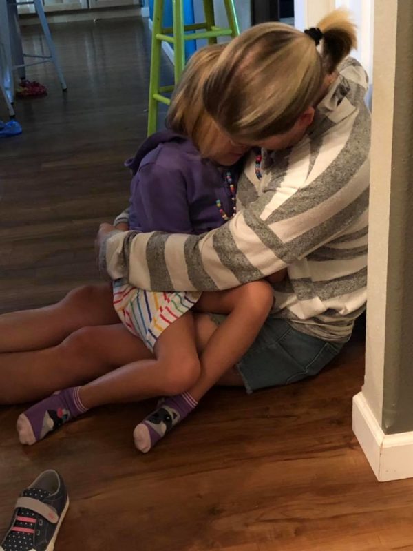 This Mom Was All Of Us On The First Day of Kindergarten | Mom of three, Carolyn Moore, was fully prepped for summer to end and school to start. She'd done the kindergarten routine before with her two eldest, who just started fifth and third grade respectively. But Moore, a writer at Assignment Mom, wasn't prepared for the flood of emotions that came with sending her youngest off to school for the first time.