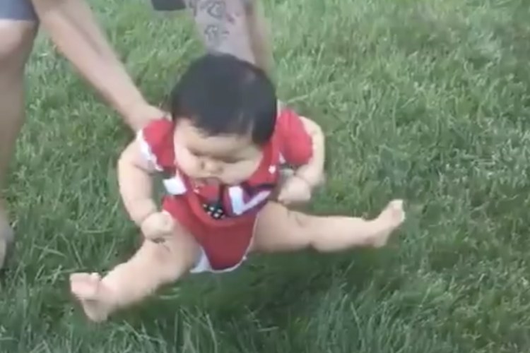 Viral Video Proves Babies Hate Grass