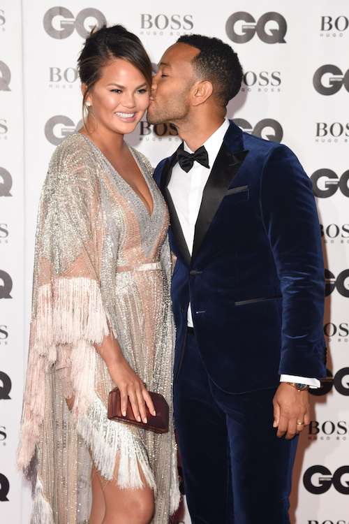 Chrissy Teigen and John Legend proving parents and PDA can still go together.