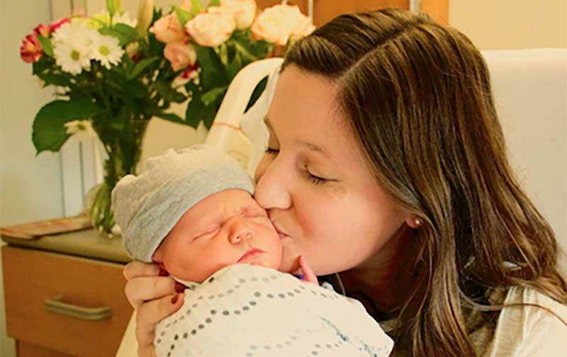 Tori Roloff kissing Baby Lilah Ray