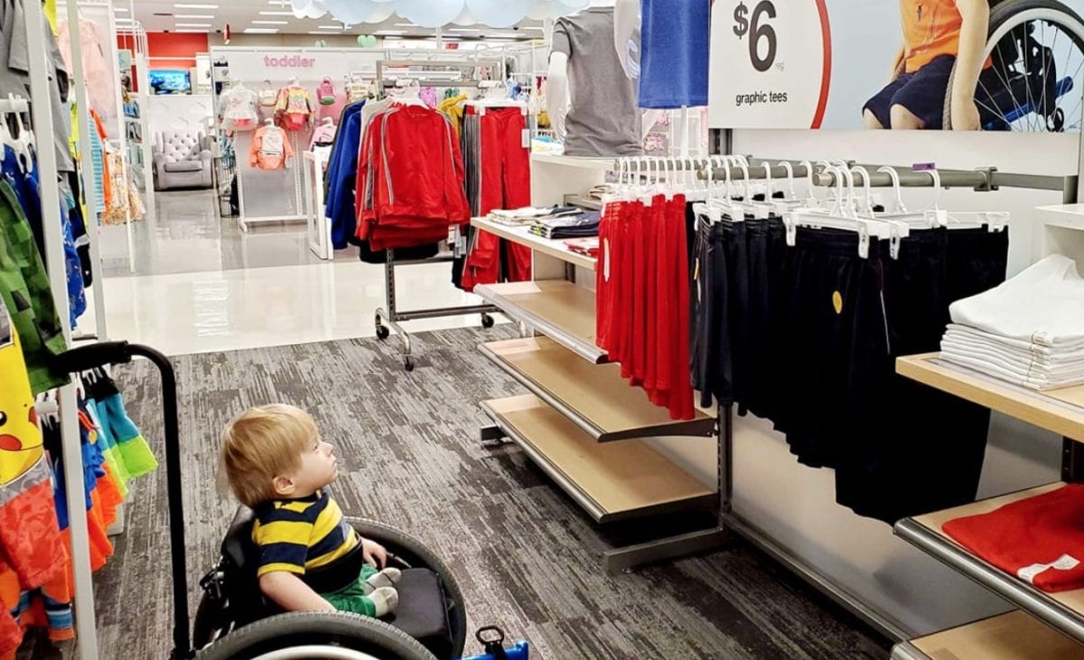 Photo of Toddler in Wheelchair Looking at Target Ad That Looks Like Him in 'Awe' Goes Viral