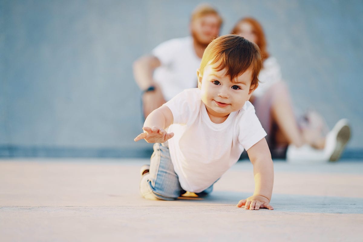 Red haired boy crawling 30 Irish-Inspired Baby Names for Boys and Girls