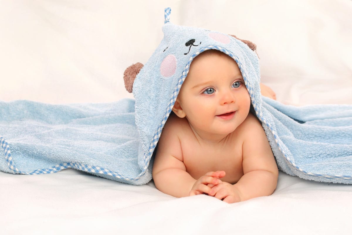 Boy with bath towel 30 Irish-Inspired Baby Names for Boys and Girls