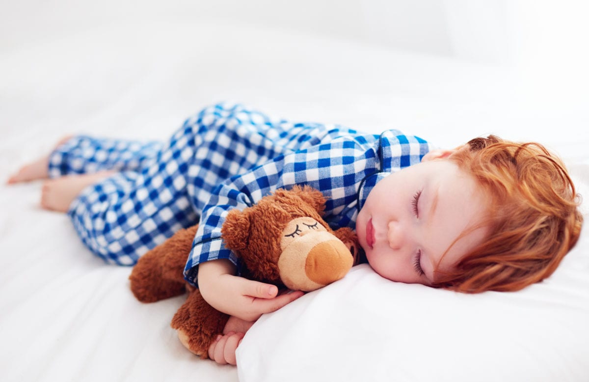 Red haired boy sleeping 30 Irish-Inspired Baby Names for Boys and Girls