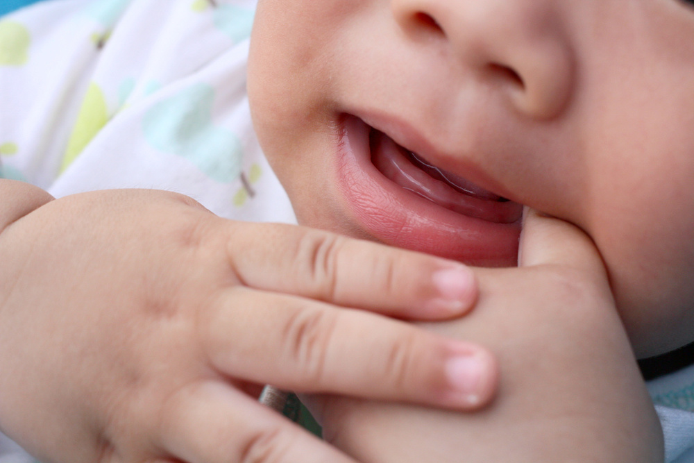 My 8-Month-Old Baby Is Grinding Her Teeth: How Can I Get Her to Stop?