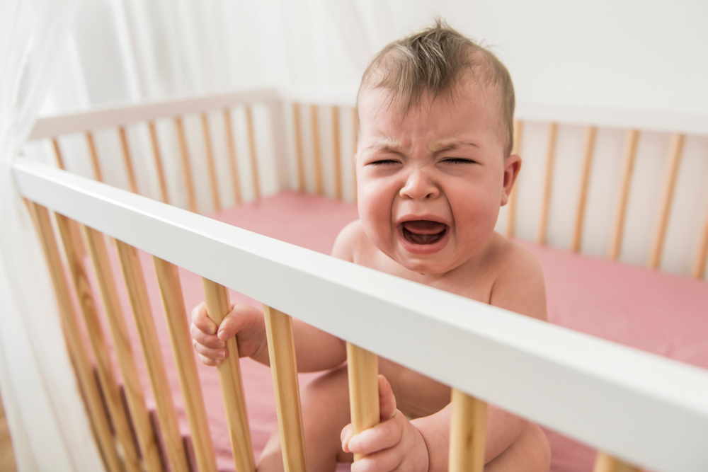 My 9-Month-Old Baby Wakes Up Multiple Times a Night in Tears: Is This Normal?