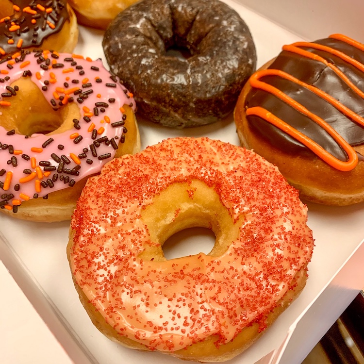 Dunkin' has a Spicy Ghost Pepper Donut and a Halloween DIY Decorating Kit with Orange Frosting and Various Sprinkles