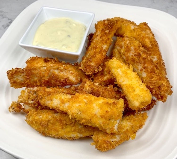 Jennifer Garner's Crispy Fish Sticks Recipe Finished Fish Sticks on a plate with dipping sauce