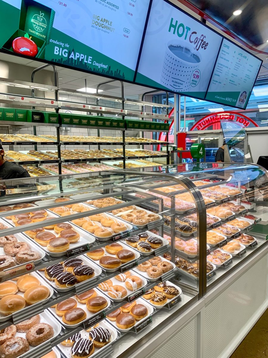 Krispy Kreme Times Square Display Case with a Variety of Doughnuts