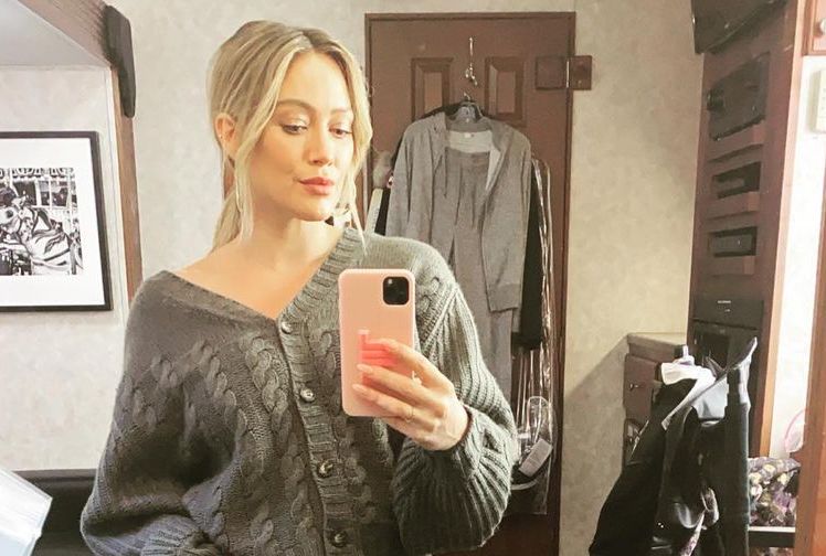 Pregnant Hilary Duff in Quarantine After COVID-19 Exposure, Shows Off Baby Bump for First Time