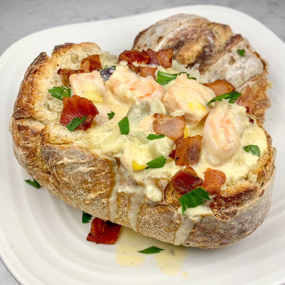 30 Minute Seafood Chowder Bread Bowls from Ayesha Curry