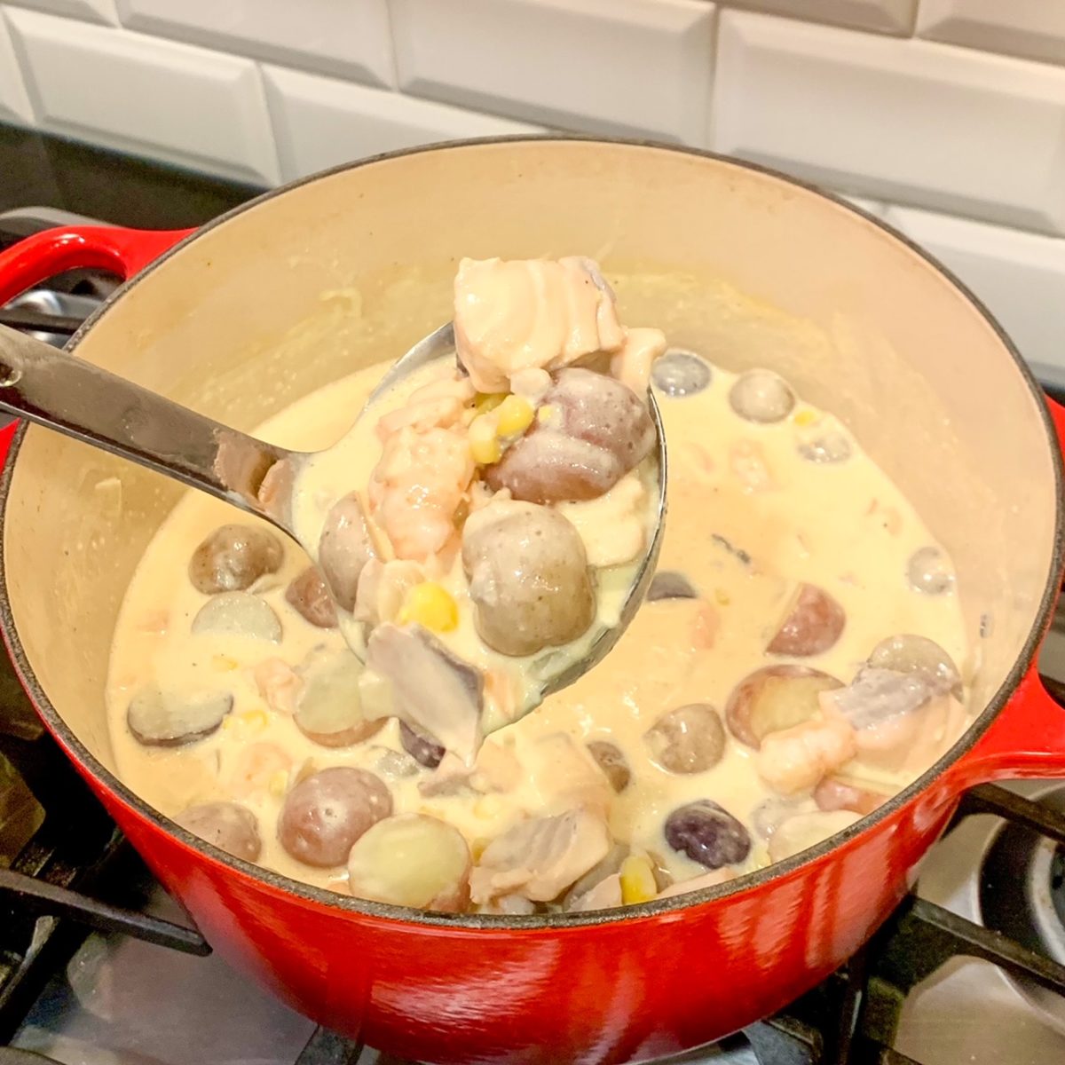 30 Minute Seafood Chowder Bread Bowls from Ayesha Curry