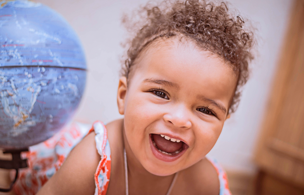 25 Joyous Baby Names for Girls That Mean 'Happy' from a Variety of Traditions 