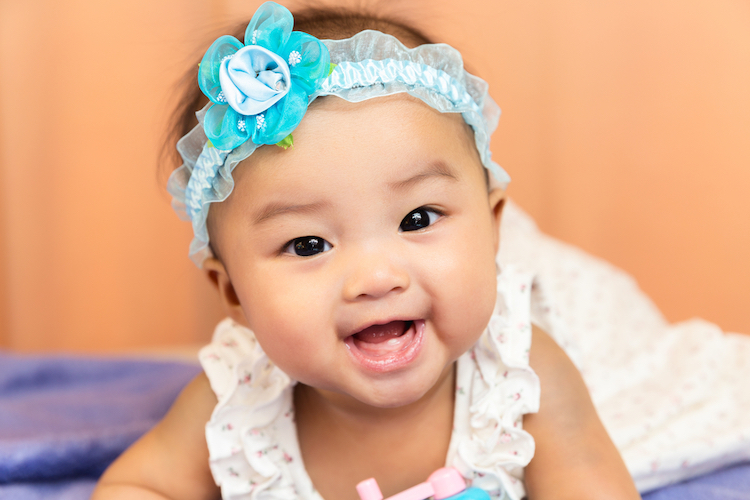 25 Bright Baby Names for Girls That Mean 'Luck'