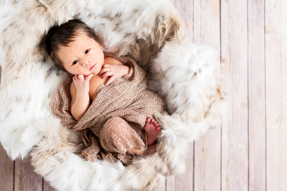 25 Tasteful Baby Names for Boys Inspired by Famous Fashion Icons