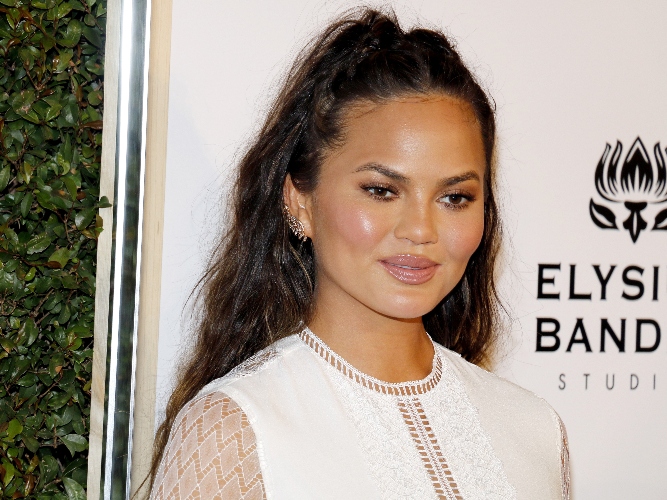 Chrissy Teigen Posts Swollen Lips, Insists It's Not Filler