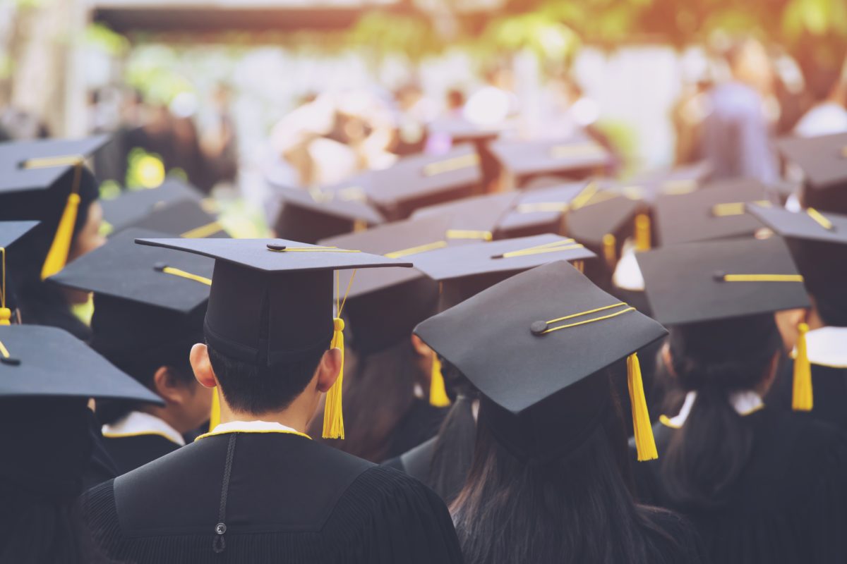 Teacher Steps In After High School Senior Told He Can't Walk At High School Graduation With Sneakers