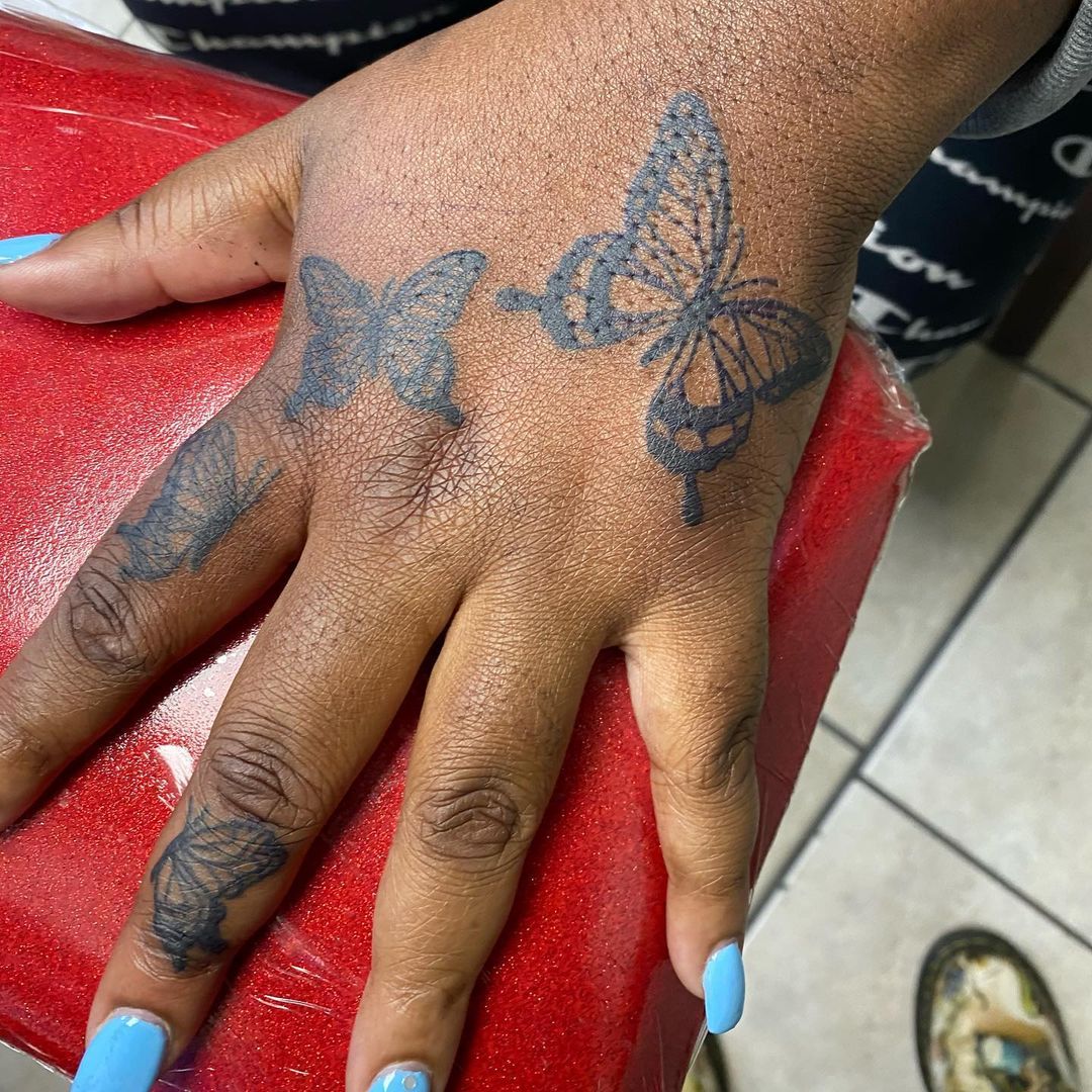 55 Butterfly Hand Tattoo