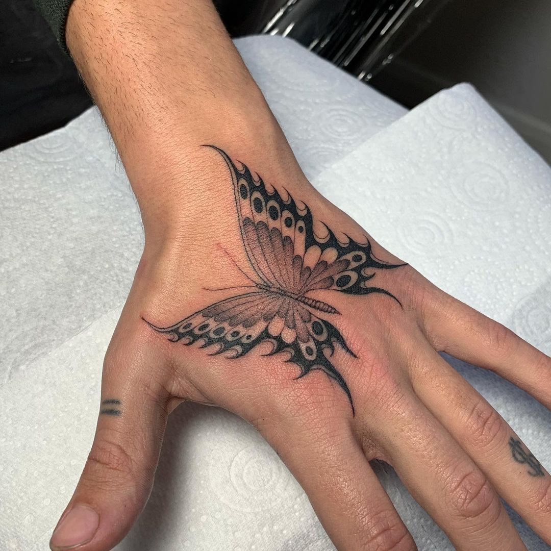 55 Butterfly Hand Tattoo