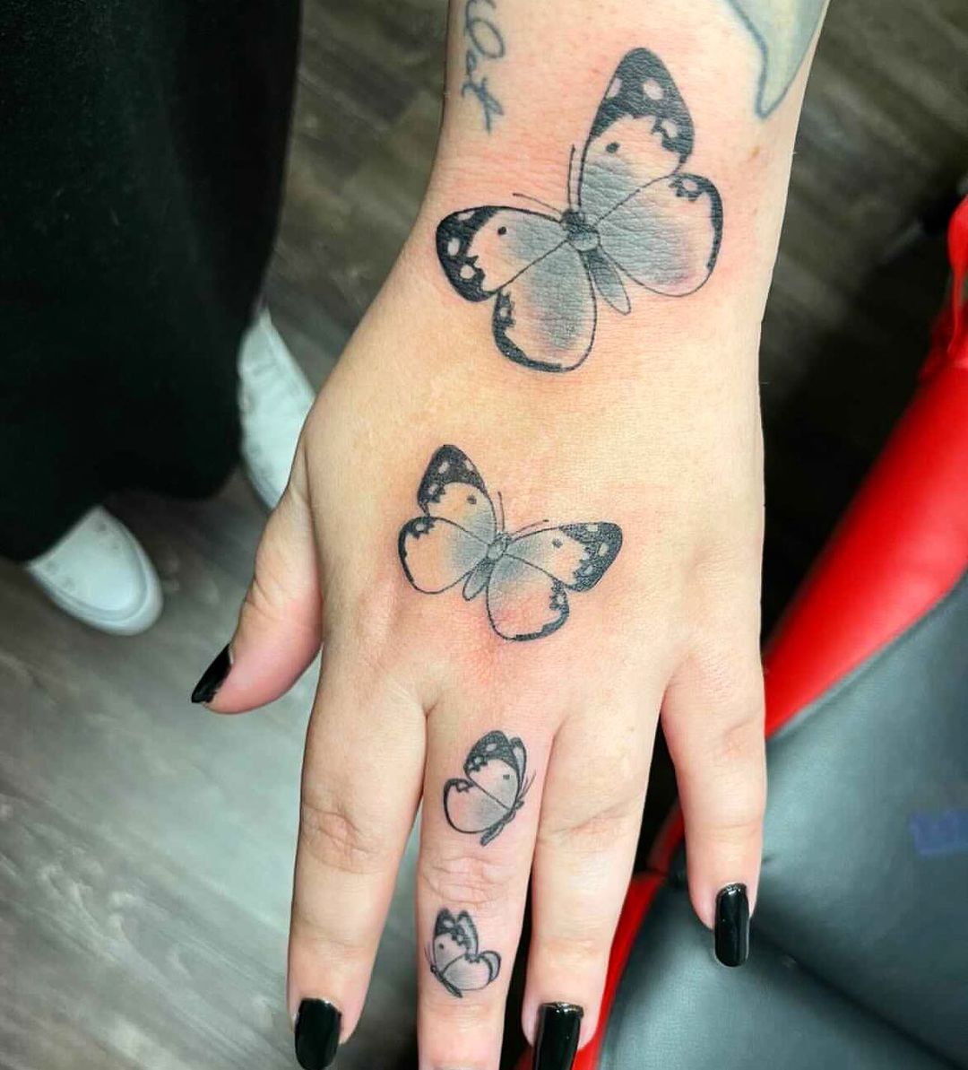 55 Butterfly Hand Tattoo