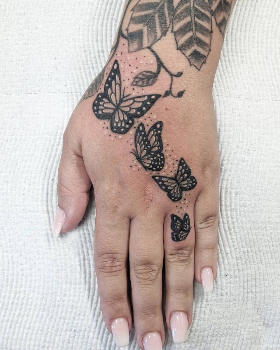 55 Butterfly Hand Tattoo