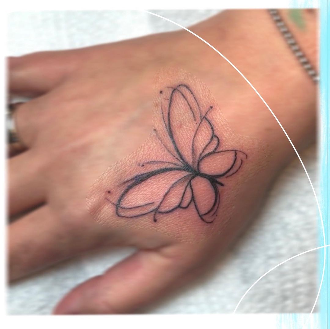 55 Butterfly Hand Tattoo