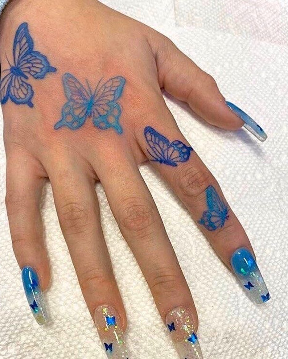 55 Butterfly Hand Tattoo