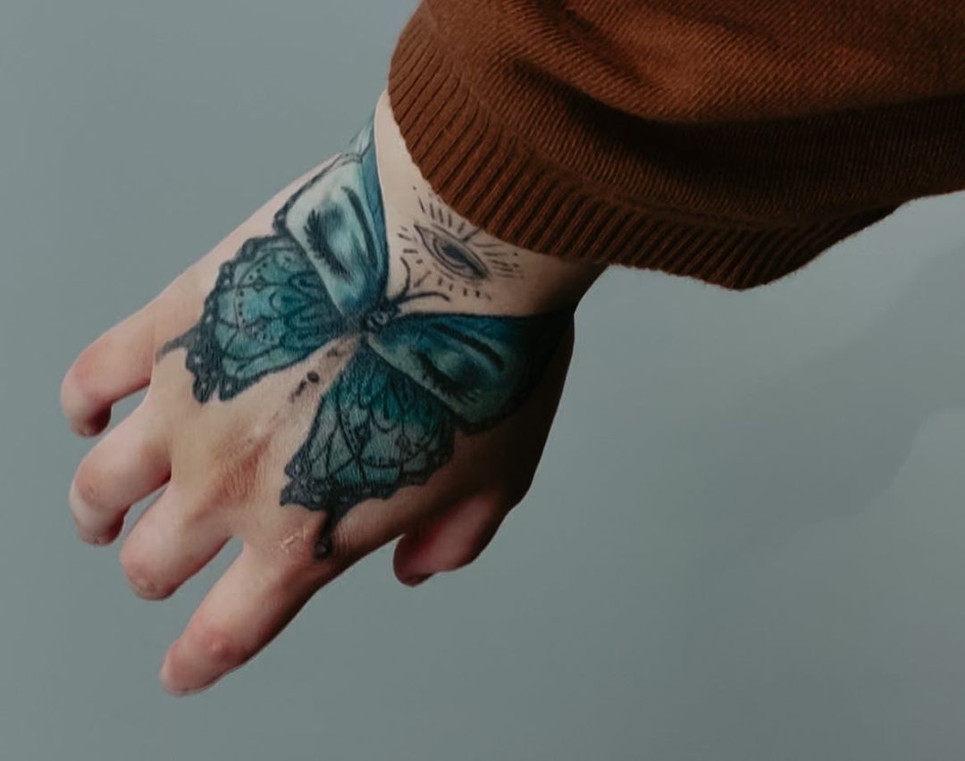 55 Butterfly Hand Tattoo