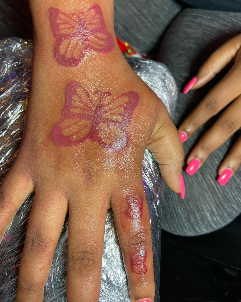 55 Butterfly Hand Tattoo