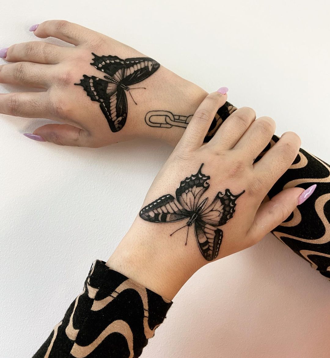 55 Butterfly Hand Tattoo