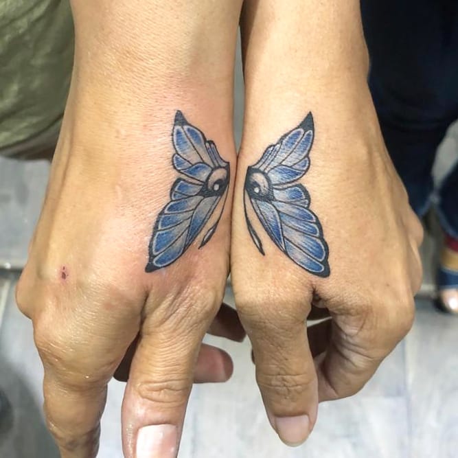 55 Butterfly Hand Tattoo