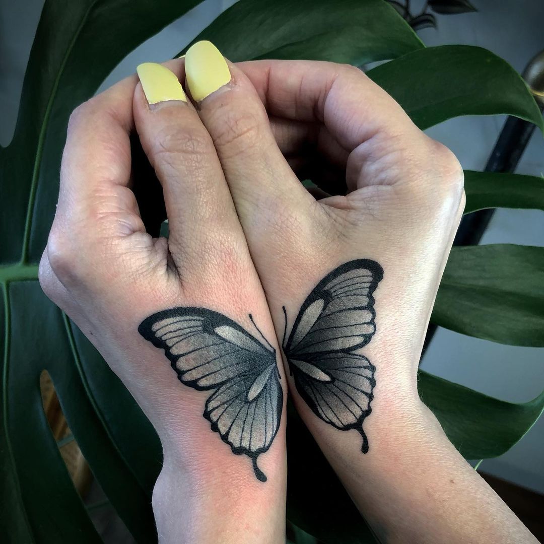 55 Butterfly Hand Tattoo