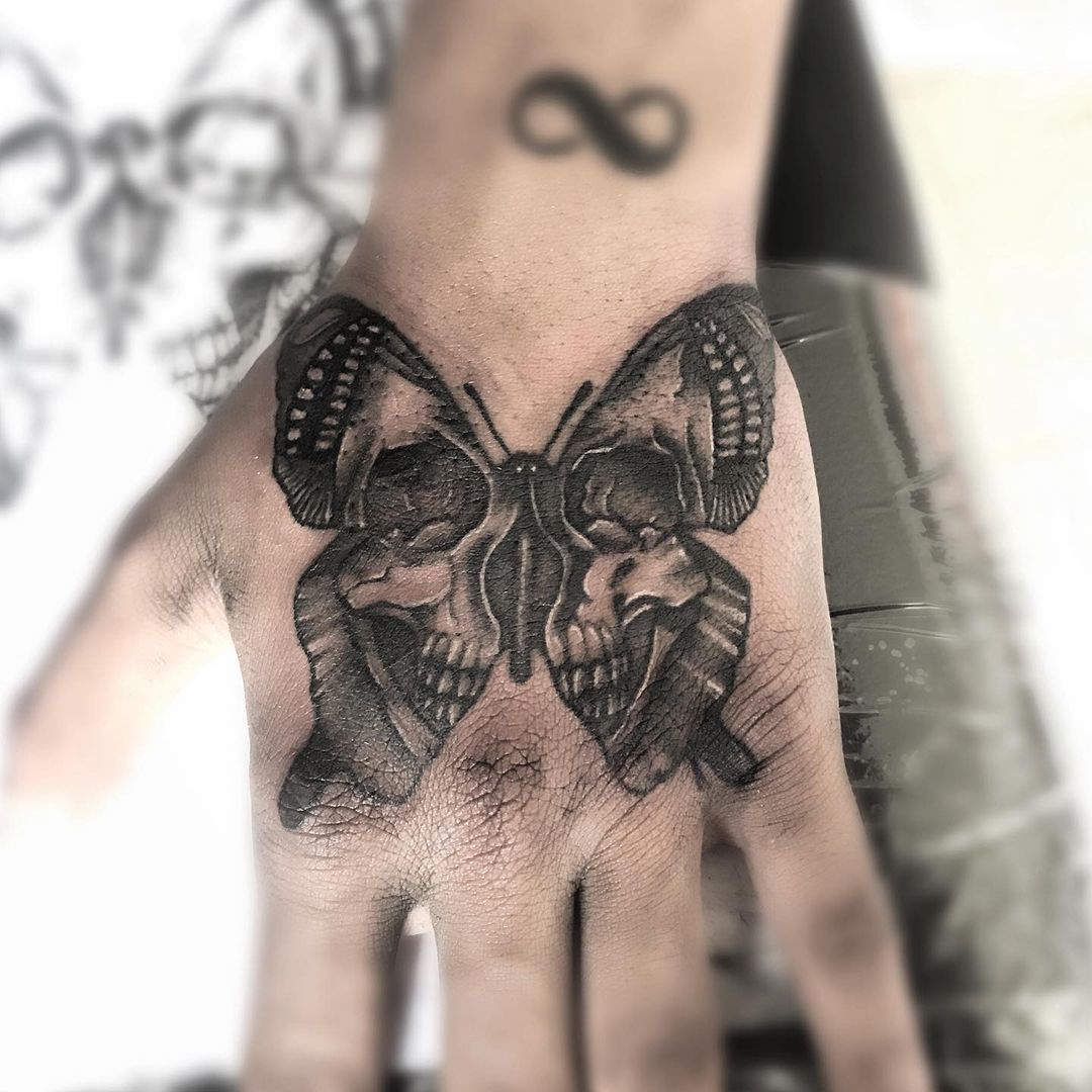 55 Butterfly Hand Tattoo