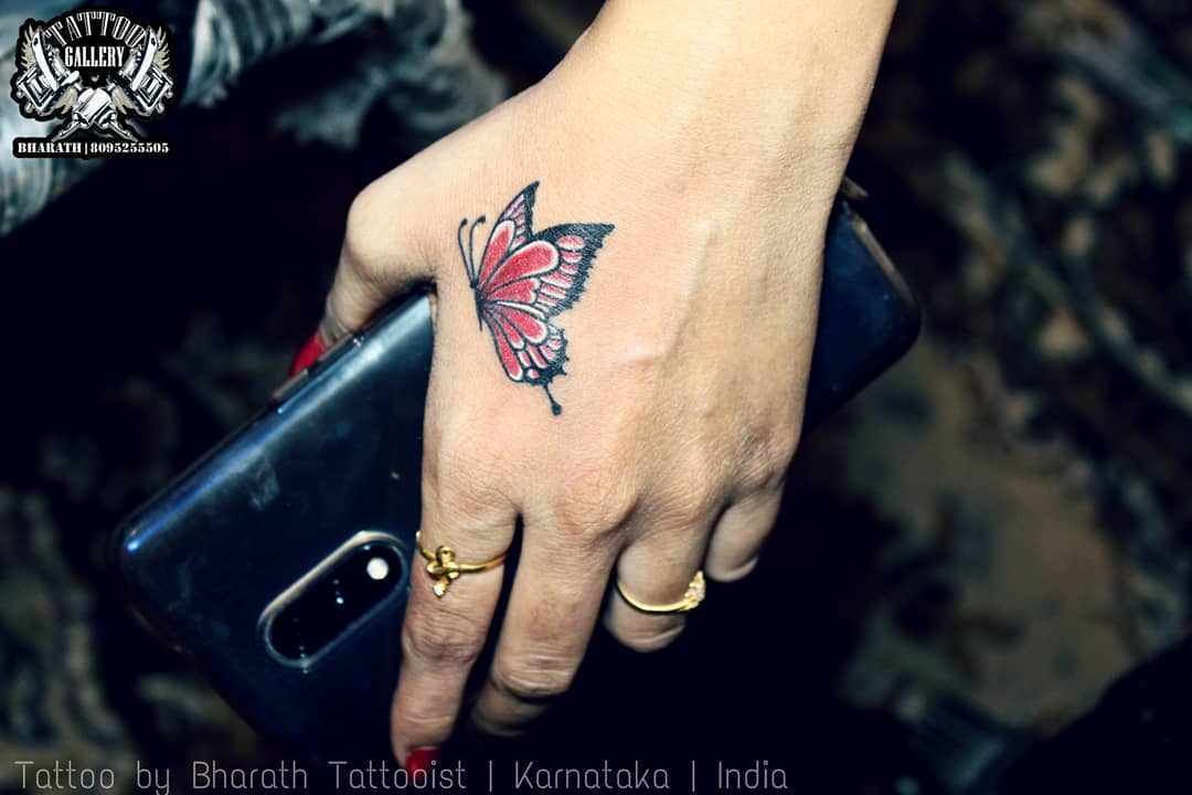 55 Butterfly Hand Tattoo