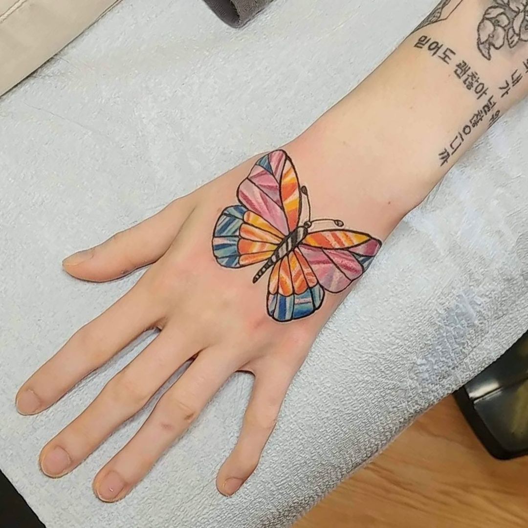 55 Butterfly Hand Tattoo