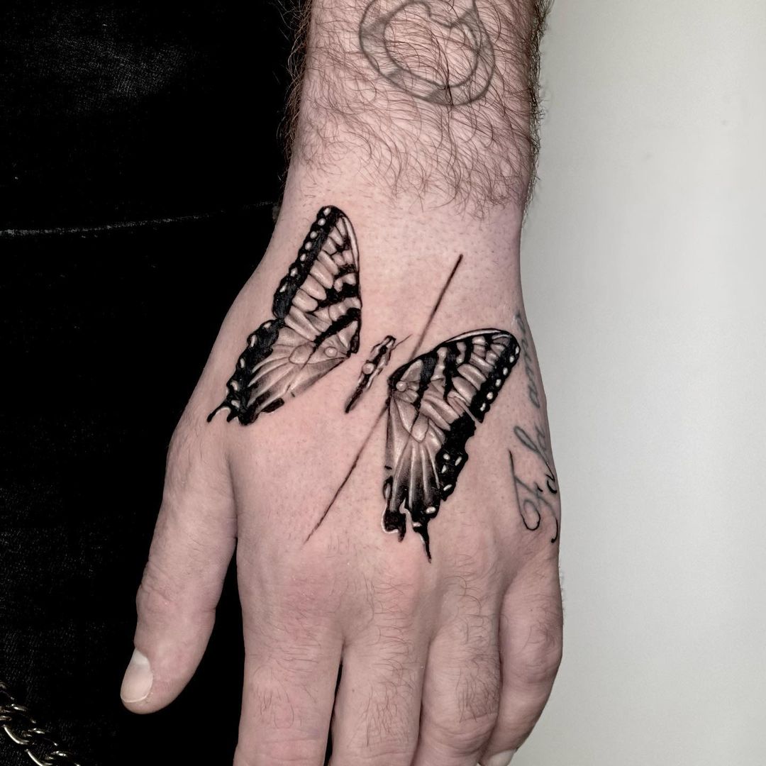 55 Butterfly Hand Tattoo