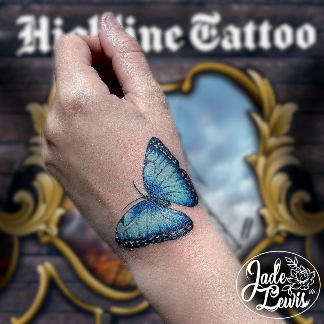 55 Butterfly Hand Tattoo