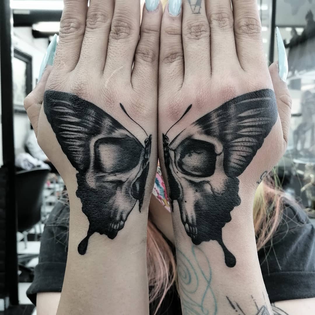 55 Butterfly Hand Tattoo