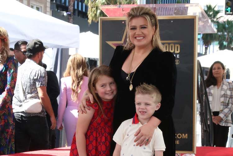 Kelly Clarkson Reveals Kids Are Still Reeling from Brandon Blackstock Divorce: 'I Wish Mommy and Daddy Were in the Same House' | "I am raising very independent children," Kelly Clarkson said of parenting after divorce.