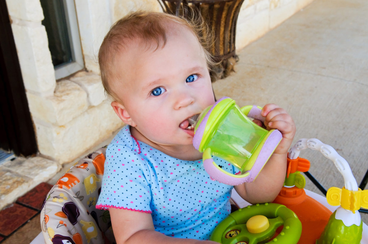 Why, When, and How to Teach Your Child to Use a Sippy Cup | Of all the milestones your baby will hit in the first few years of their life, the transition from a bottle to a sippy cup is one of the first – and, believe it or not, one of the most important to their overall well-being.