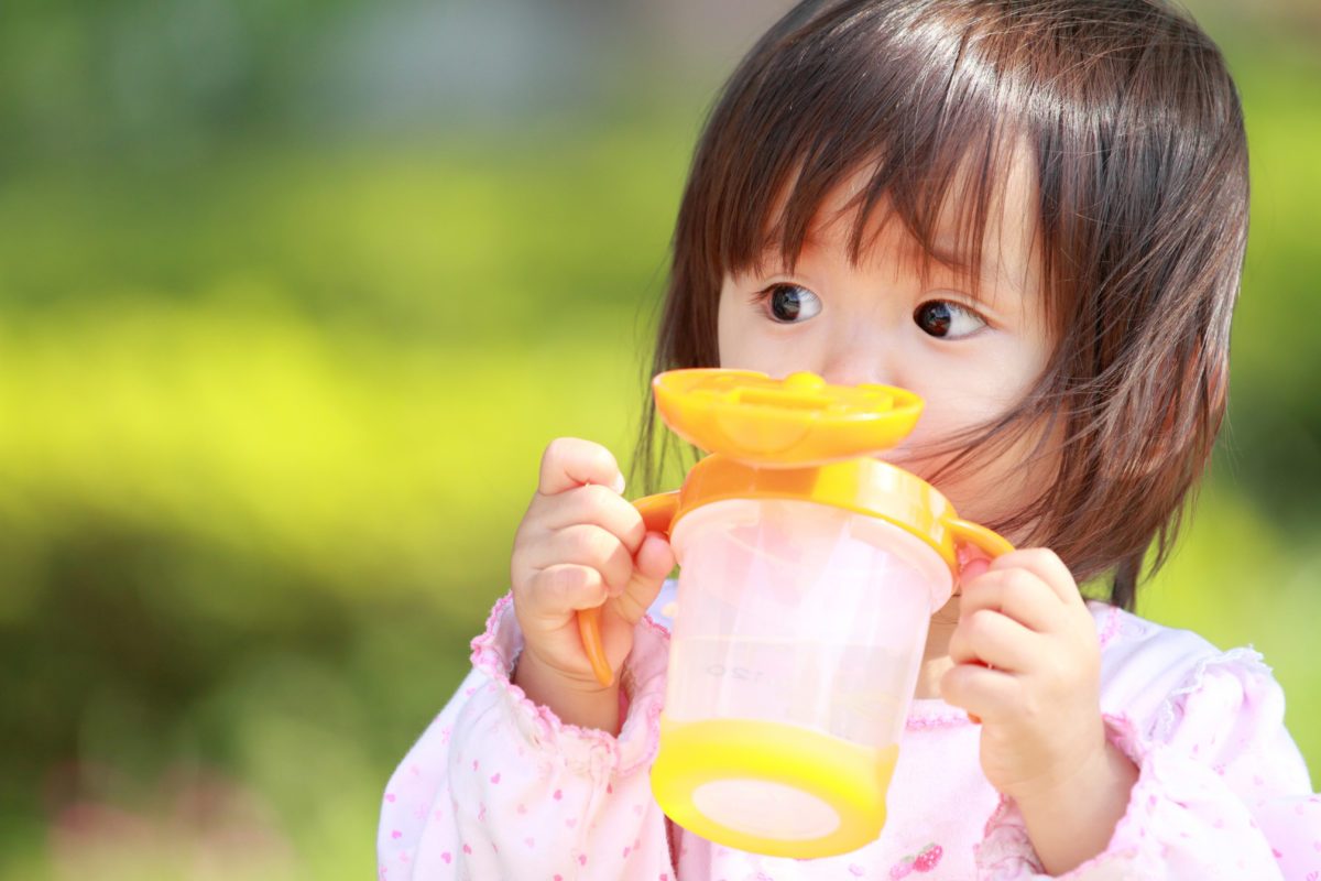 Why, When, and How to Teach Your Child to Use a Sippy Cup | Of all the milestones your baby will hit in the first few years of their life, the transition from a bottle to a sippy cup is one of the first – and, believe it or not, one of the most important to their overall well-being.